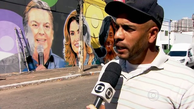 Grafiteiros pintam artistas da Globo em muro perto da Rede Record