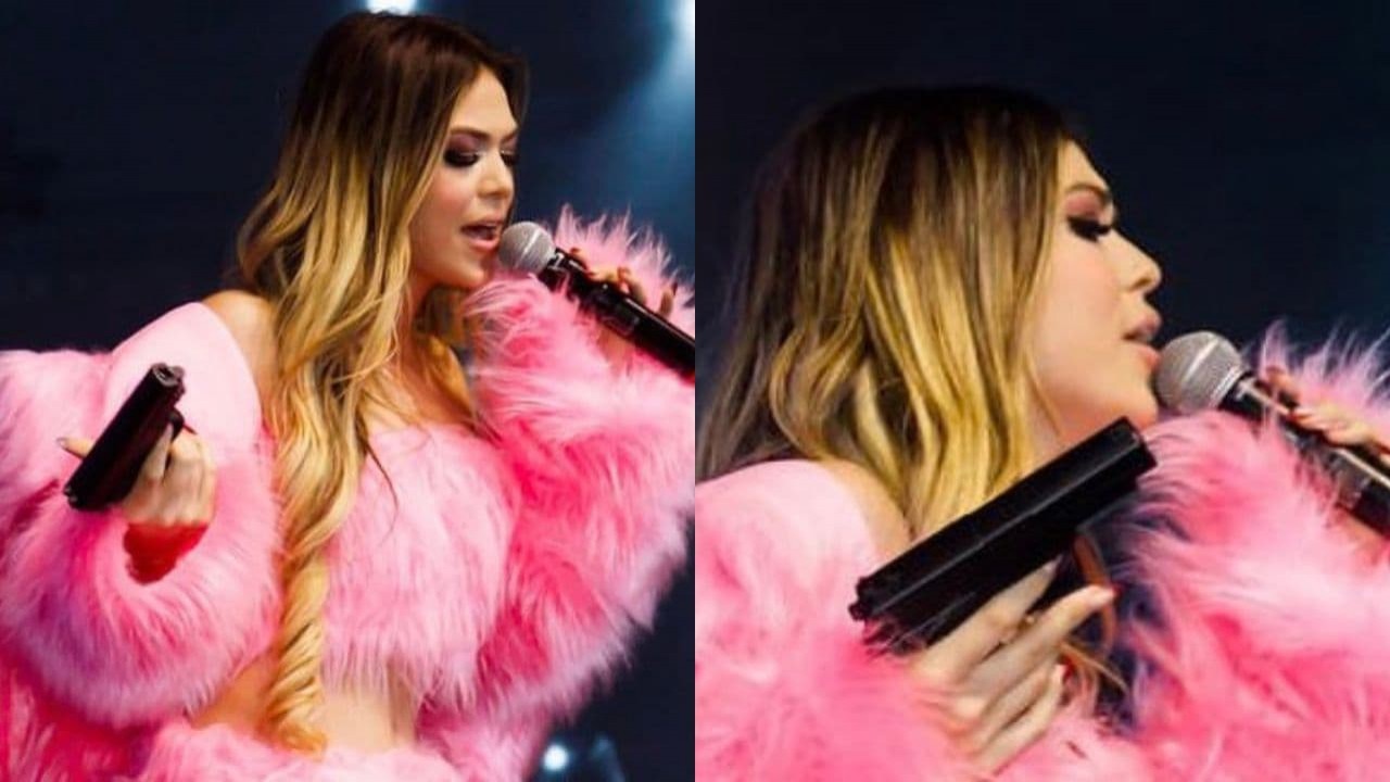 Melody surge com arma em palco e pai da cantora se pronuncia: “Acessório”